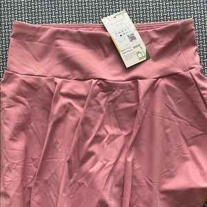 Brand new, with tags! Small Halara 2 in 1 tennis skirt in pink